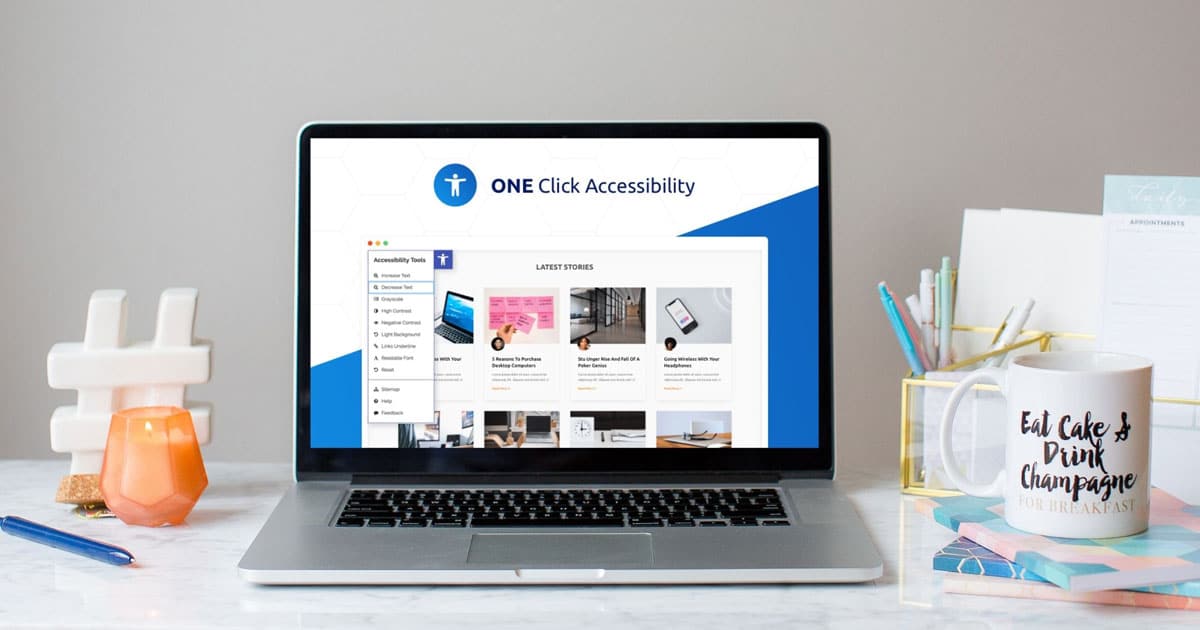 This is a photo of a desktop with a laptop on it. The One Click plugin website is on the screen.