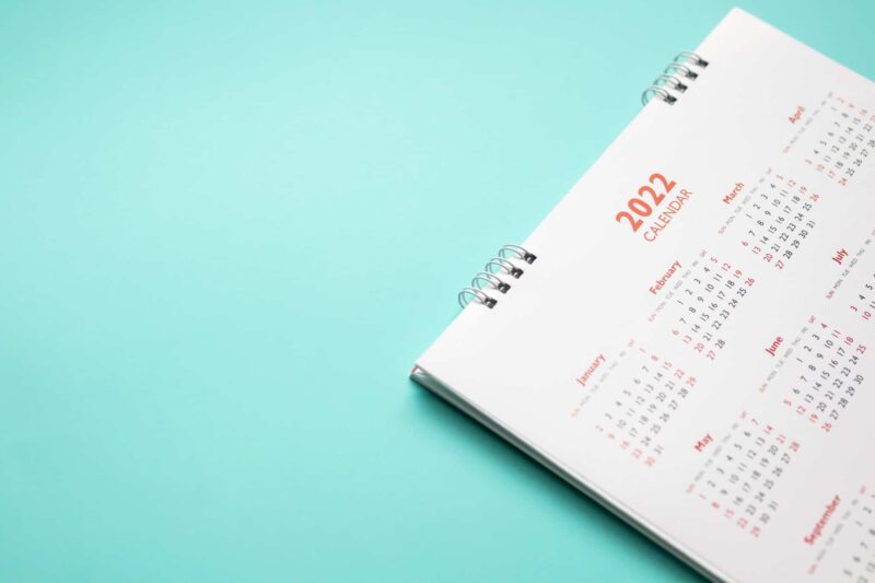 2022 calendar on a blue table
