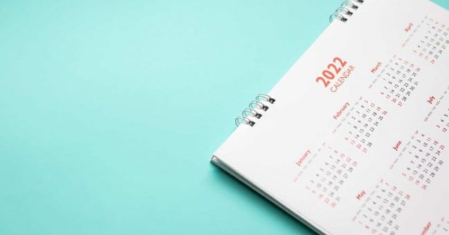 2022 calendar on a blue table